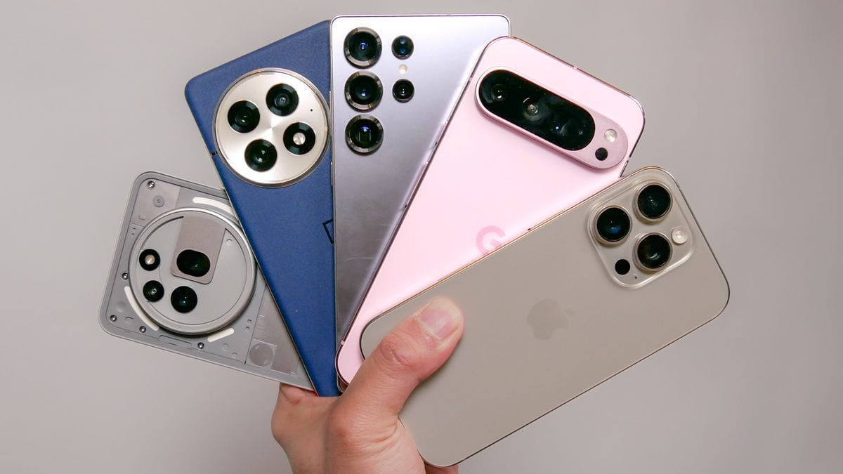 Modern smartphones displayed side by side, showcasing sleek designs, large screens, and thin bezels.