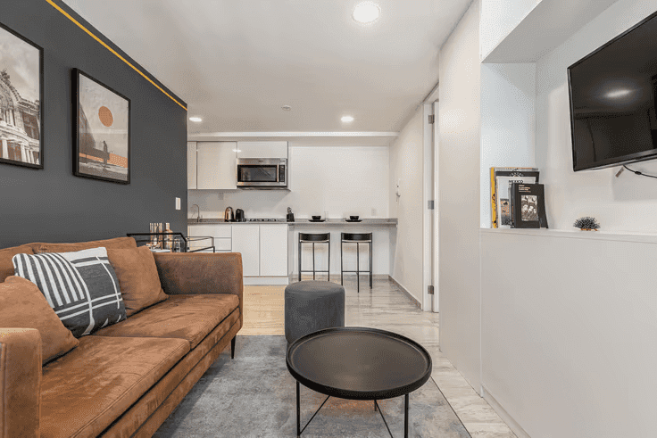Mexico offers an affordable lifestyle with inexpensive street food, low rent, and proximity to the United States. A tastefully furnished one-bedroom apartment in Mexico.