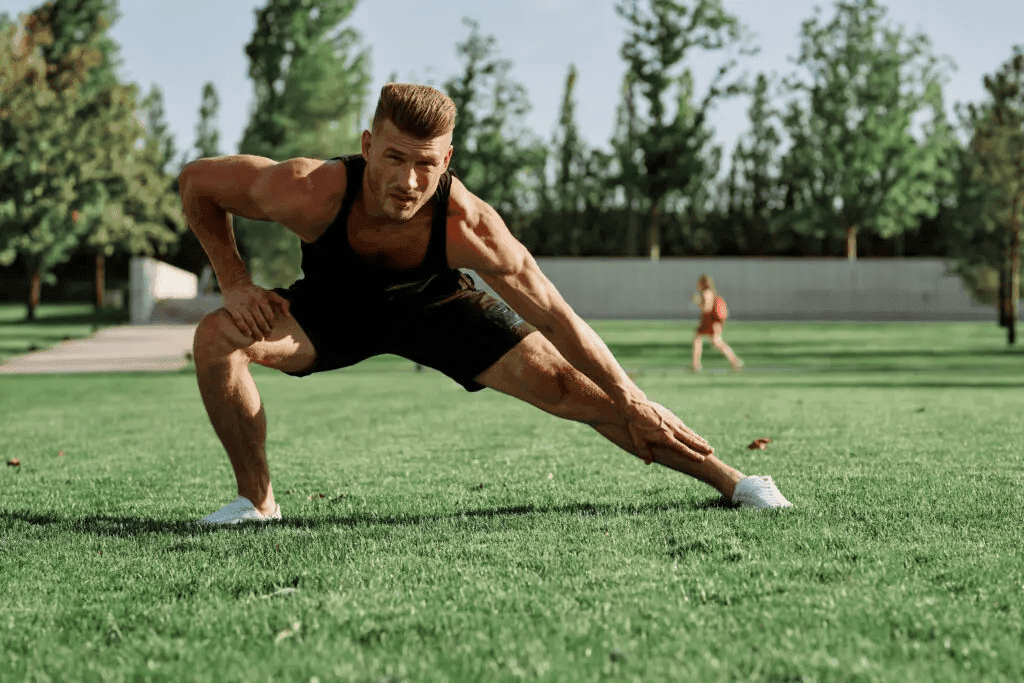 Man doing bodyweight exercises guided by Adidas Training