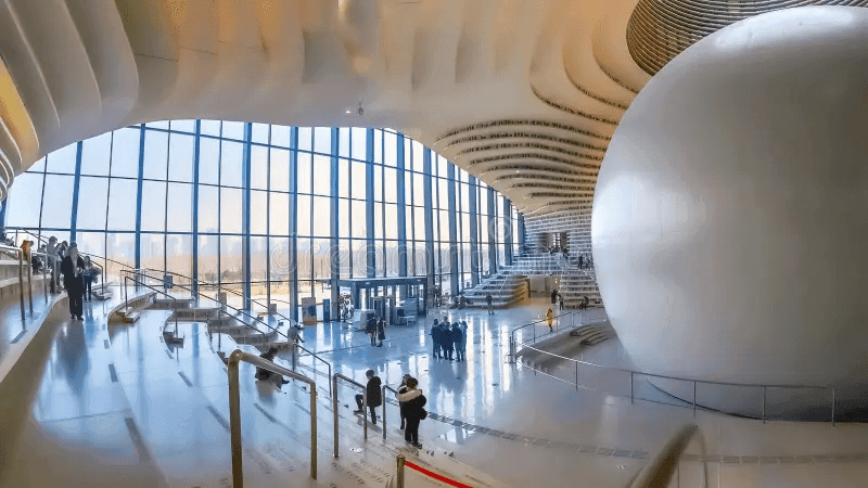 Tianjin Binhai Library’s eye-shaped interior with curved shelves, beautiful libraries
