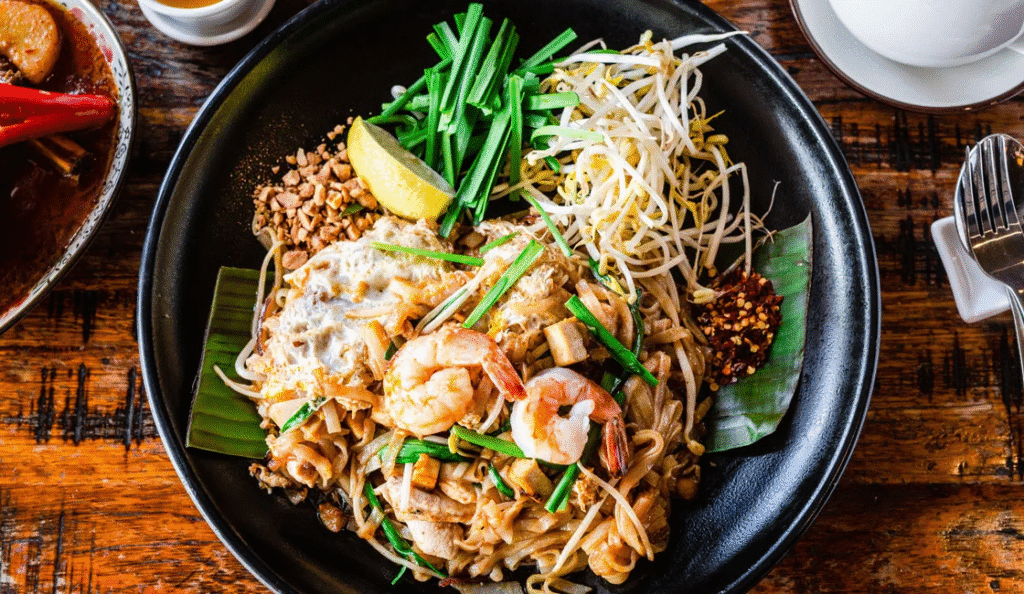 Colorful Pad Thai noodles stir-fried with shrimp, tofu, and peanuts, proving why Thailand ranks among the best meals in the world